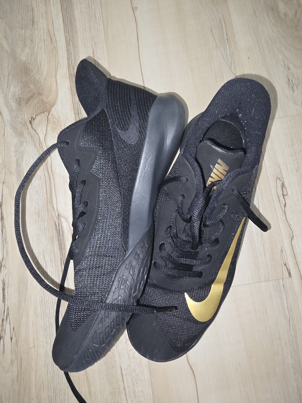 Nike Black and Gold Running Sneakers